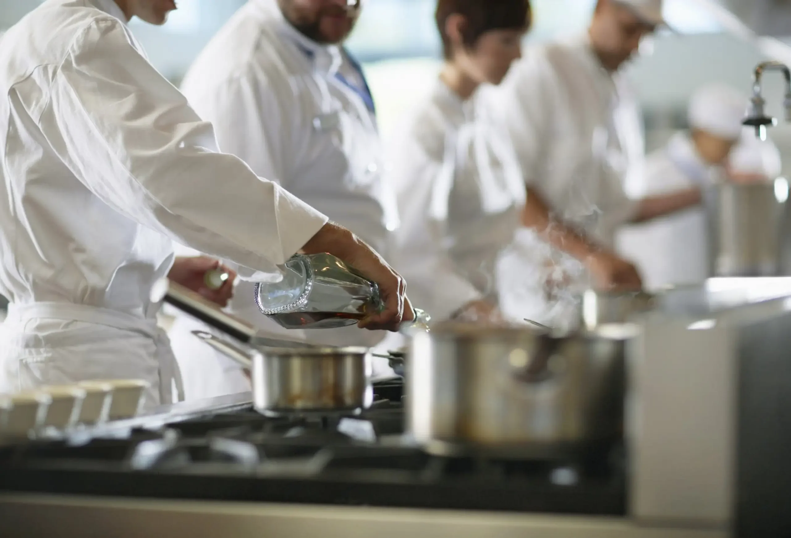 Chefs using gas hobs