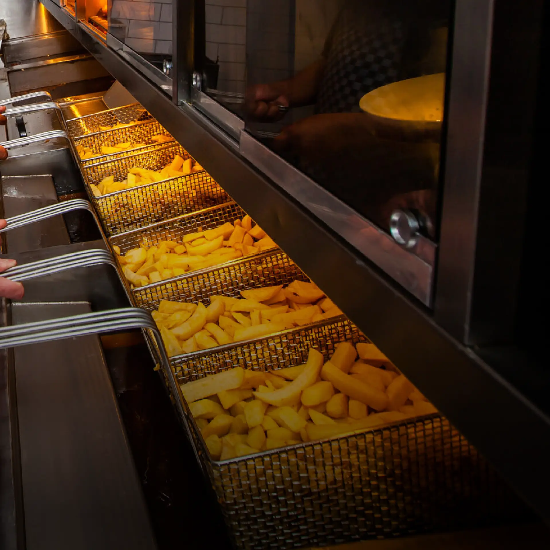 Chips in numerous frying pans