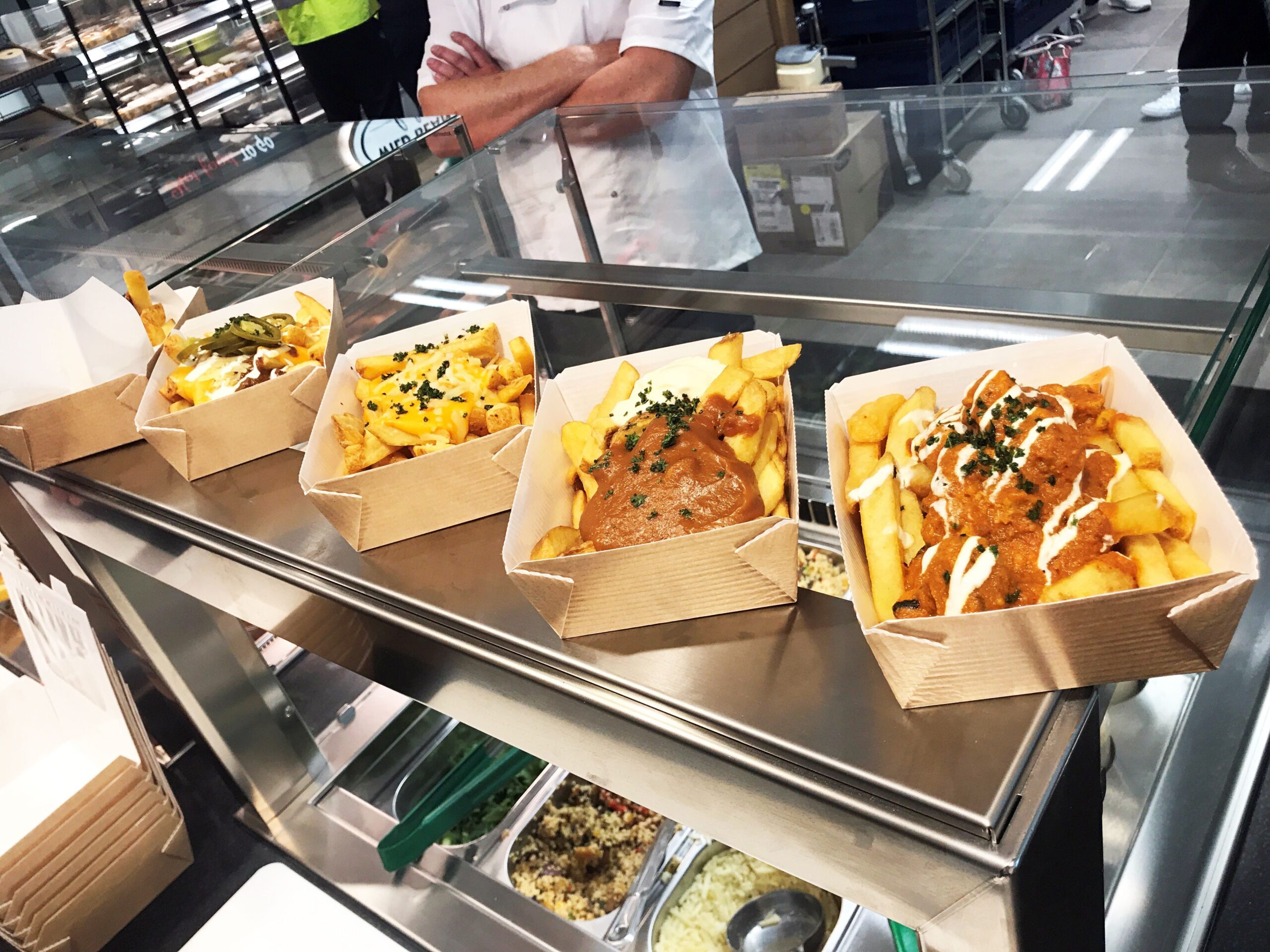 Image of loaded chips in takeaway boxes