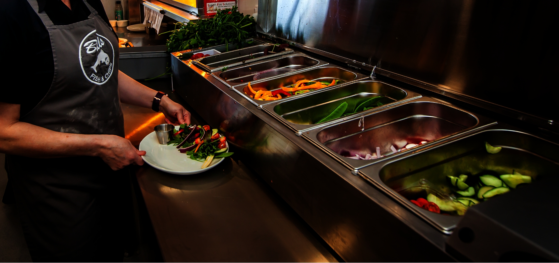 Image of deli and cold food being served from a Florigo food counter