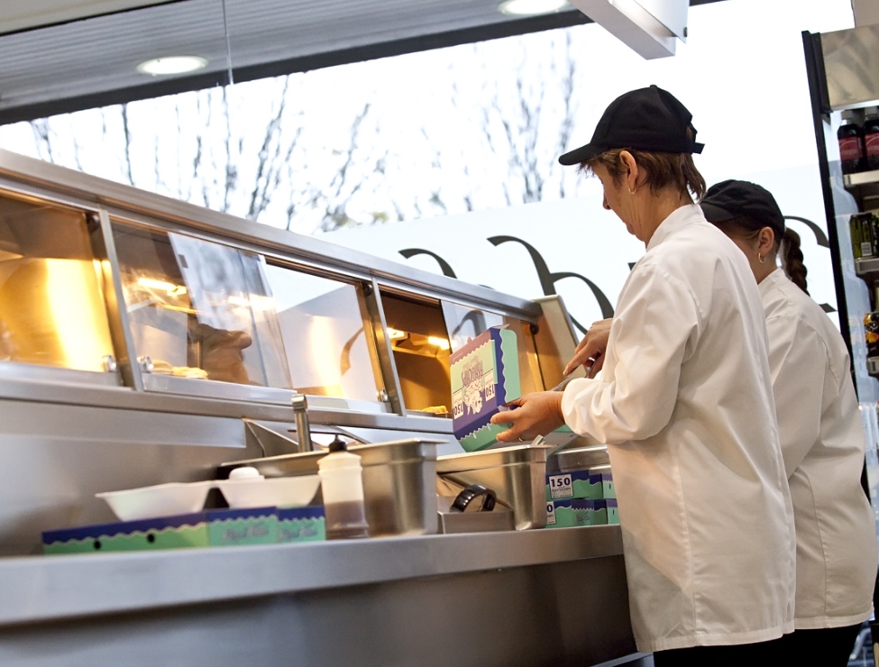 Serving fish and chips from a Florigo food counter