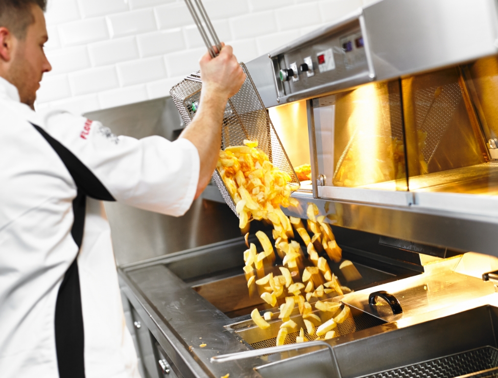 Florigo Frying Pan being used by a man in Florigo chef whites